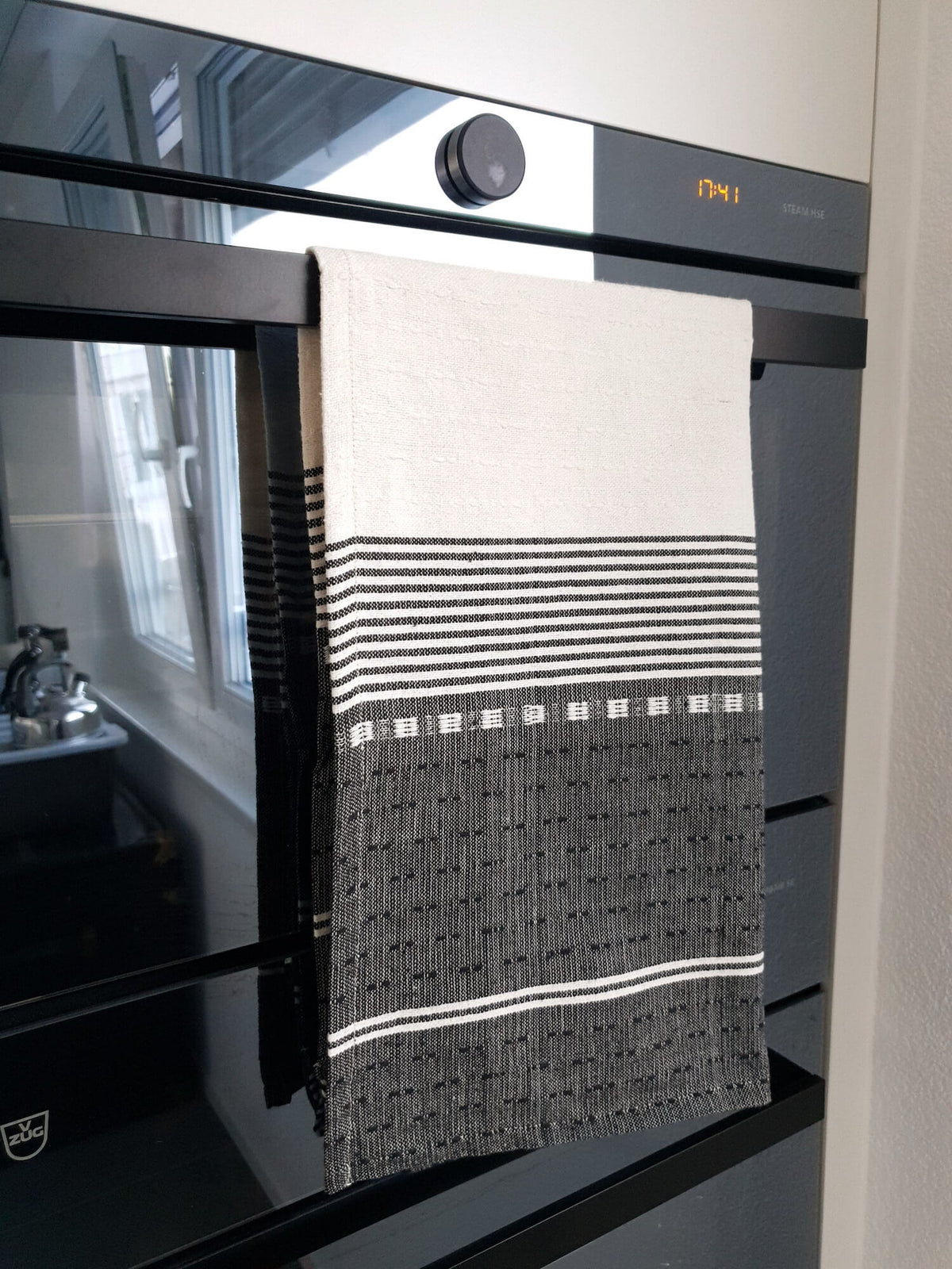Cotton Kitchen Towel Black & White hanging in oven