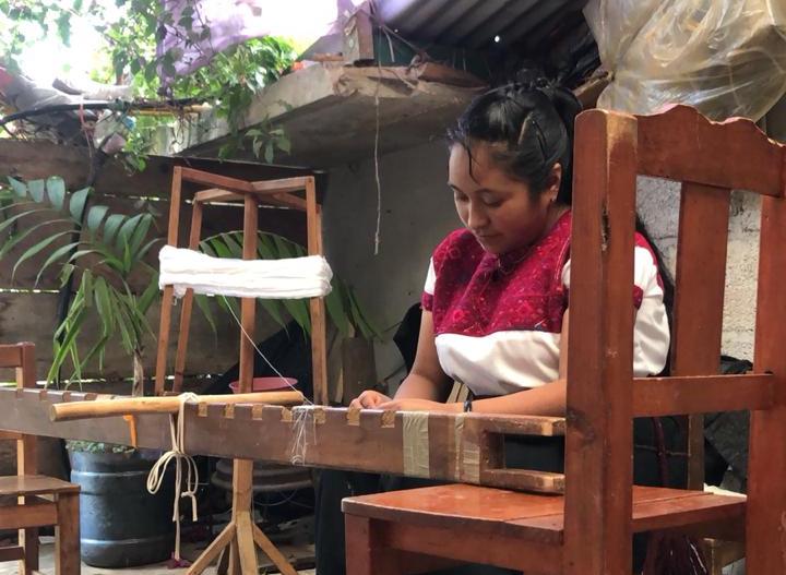products/Luci-artisan-preparing-backstrap-weaving.jpeg