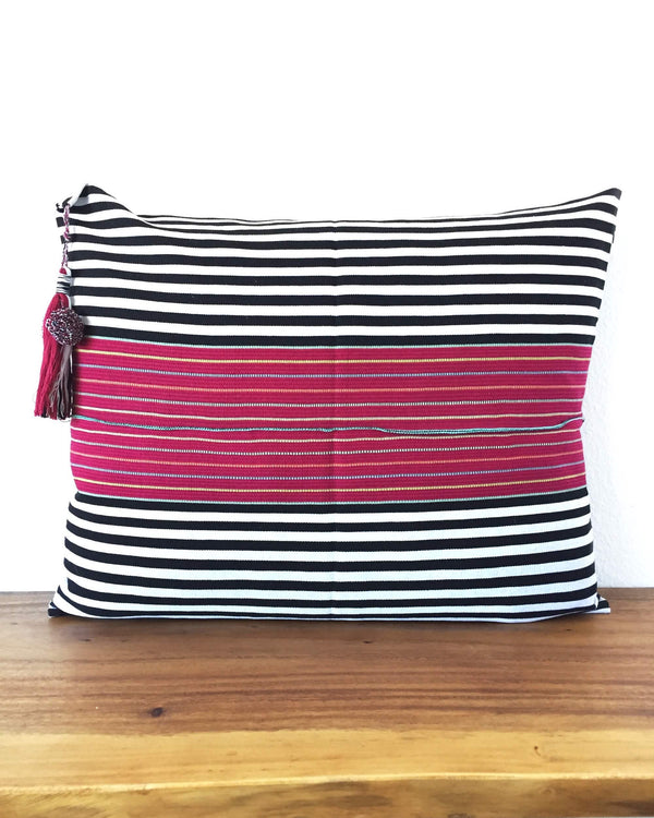 Nachig Lupe Throw Pillow black and white horizontal stripes with pink accent in middle front view 
