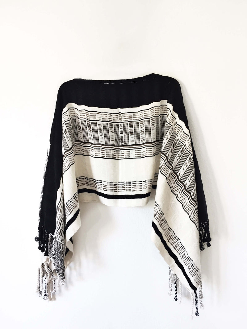 products/Taabal_Black_White_Poncho_side_position.JPG