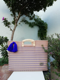 I-XU Wood Handle Tote bag in pink with blue details outdoor
