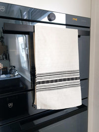 Cotton Kitchen Towel White with Black Stripes hanging in kitchen