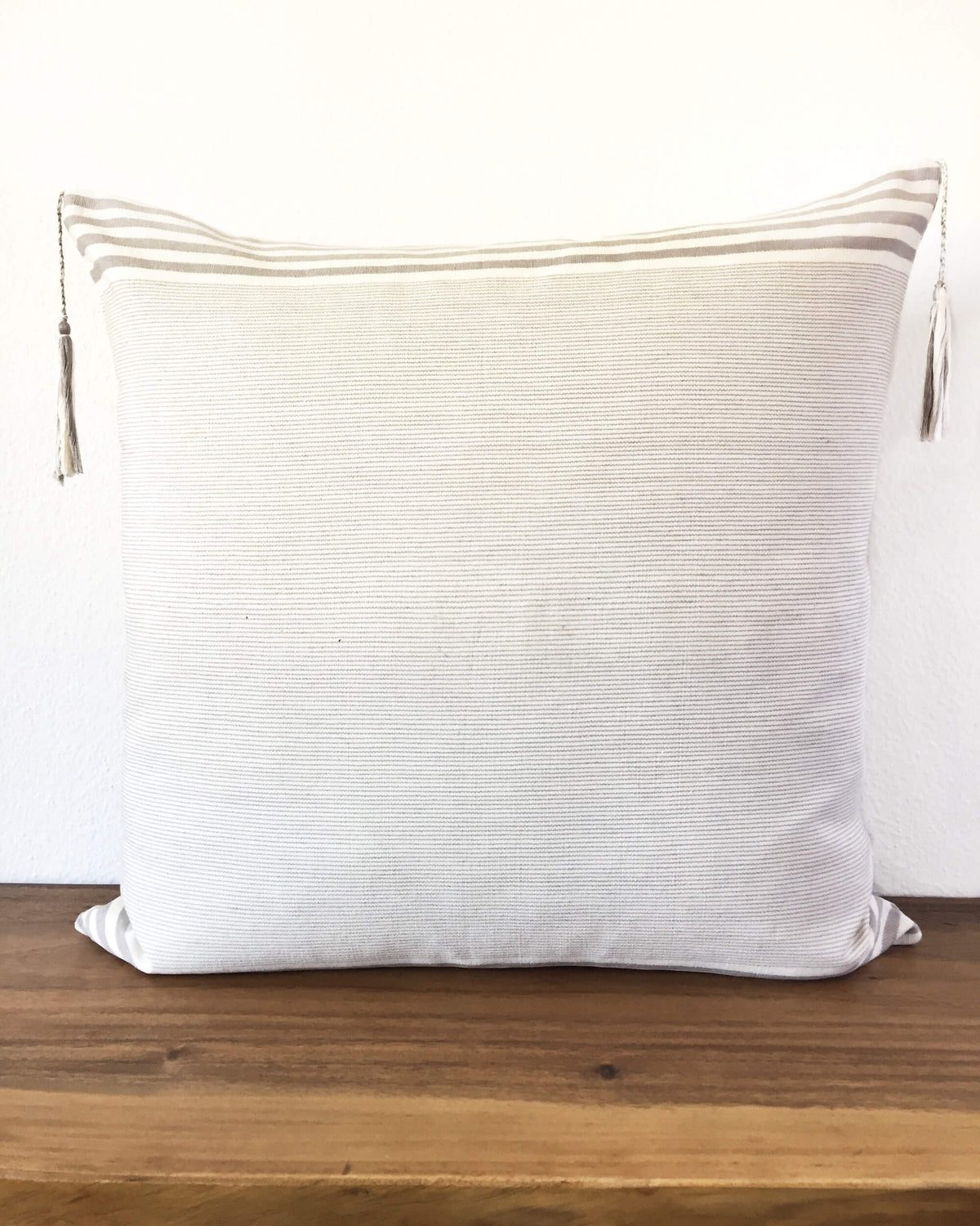 Lupita Hielo Throw Pillow light grey back view