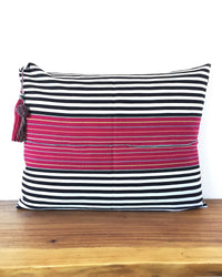 Nachig Lupe Throw Pillow black and white horizontal stripes with pink accent in middle front view 