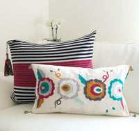 Set of two decortive Pillows with hand embroidered flowers and stripes