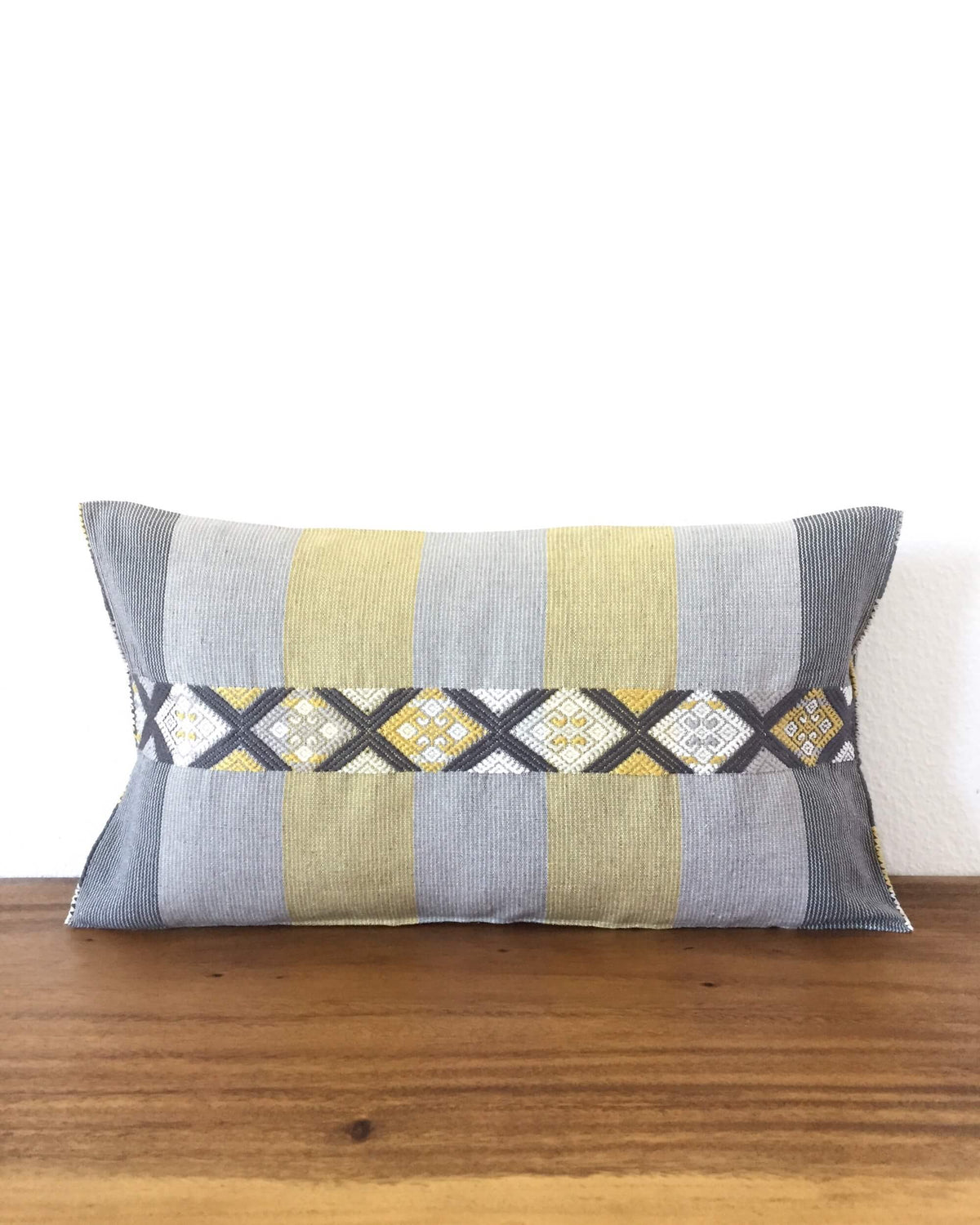 Universo Lalo Throw Pillow grey tones and a touch of yellow front view
