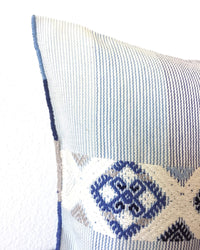 Universo Pulmo Throw Pillow light blue and grey tones with brocades in pastel colors detail view of brocades