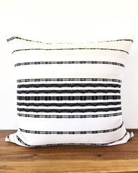 Zipolite Throw Pillow wite with black brocade stripes front view